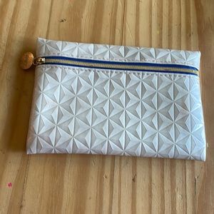 White diamond shaped ipsy bag